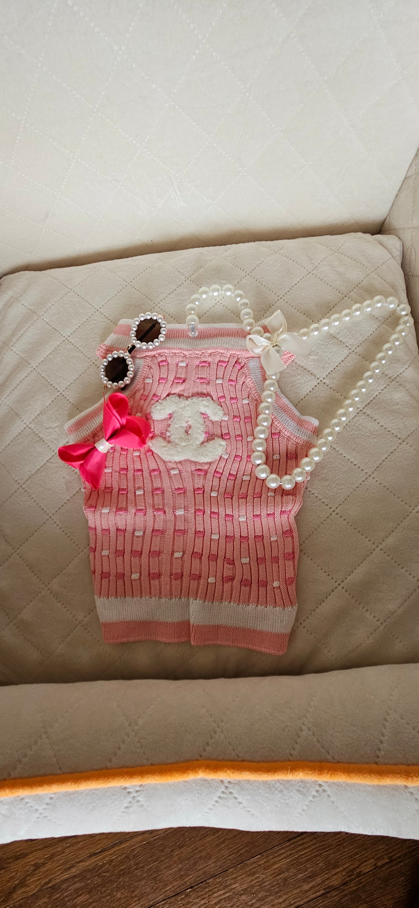 Pink sleeveless sweater vest